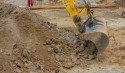 Baggerschaufel gräbt